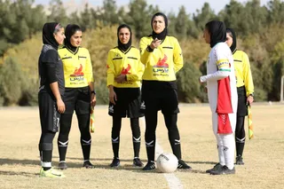 تام
