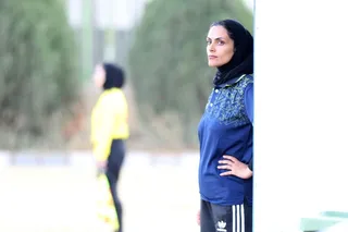 تام