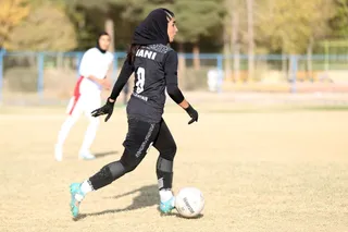 تام